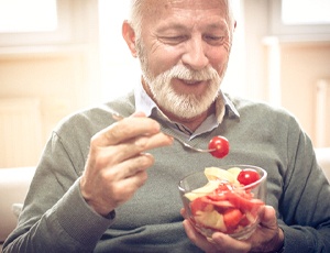 person eating a salad