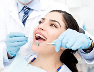 patient getting dental checkup 