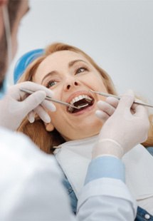 patient visiting dentist for checkup 