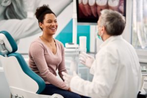 woman smiling who has taken advantage of cosmetic dentistry